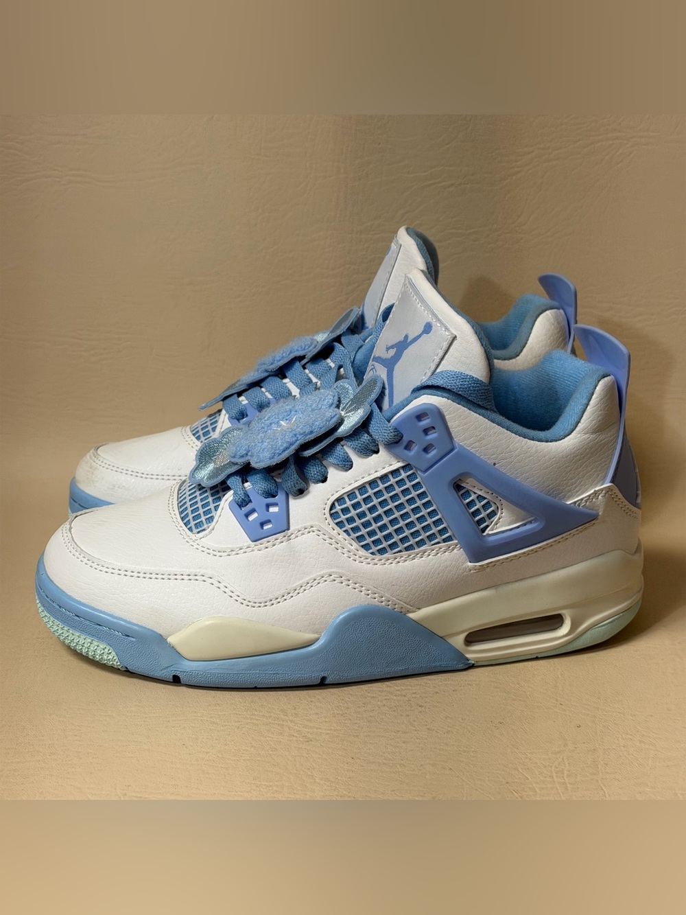 Woman’s Air Jordan 4 Retro 'Forget Me
Not' Size 7